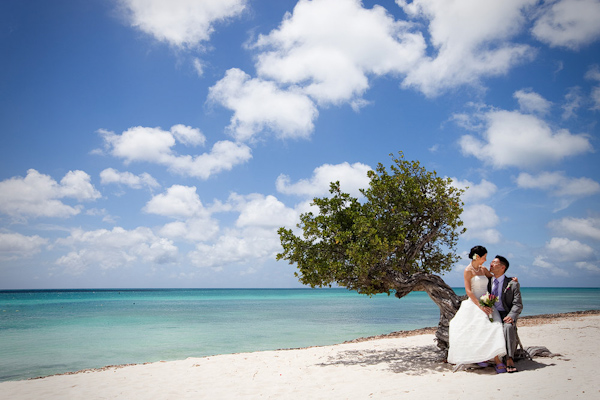 gorgeous beachfront bride and groom portrait - photo by Kenny Kim Photography